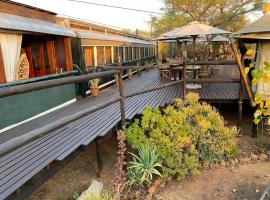 Out in Africa Wildlife Lodge, hotel en Dinokeng Game Reserve