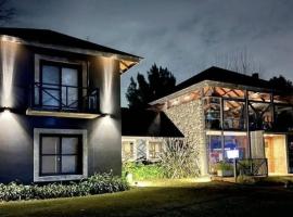 Hotel Photo: Modern Villa with exclusive heated and illuminated pool in the best Golf Country Club 18-holes golf course Indoor heated pool of the club Illuminated professional soccer and tennis courts Children's Recreation Market and all types of services