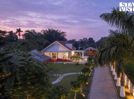 รูปภาพของโรงแรม: StayVista's Rupohi - Jorhat with Manicured Lawn & Gazebo