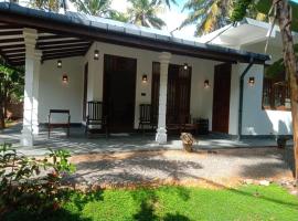 होटल की एक तस्वीर: Coconut Villa Madiha