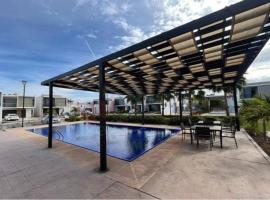 A picture of the hotel: Residencia nueva en privada con alberca 5 camas