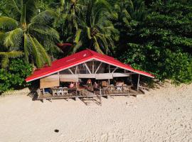 Hotel fotografie: White Beach Front and Cottages