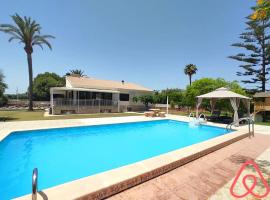 A picture of the hotel: Chalé entero con Piscina, 700 m Playa Muchavista - Playa San Juan