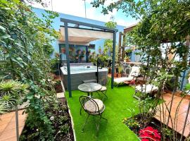 Hotel fotoğraf: Casa con jardín y jacuzzi