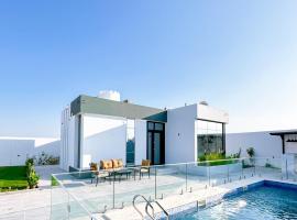 كرم شاليه, hotel v destinaci Barka