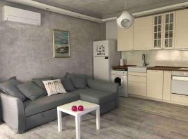 Foto do Hotel: A cozy and modern apartment Krasno selo