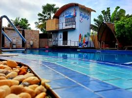 บ้านนกฮูกอิงไม้ ริมเล, hotell sihtkohas Ban Khlong Sai