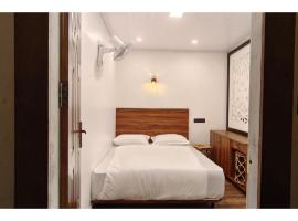 Hotel Foto: Birdwing Cottage, Munnar