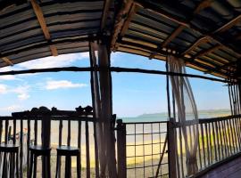 Hotel kuvat: Bluewave Sea Out Seaview Homestay