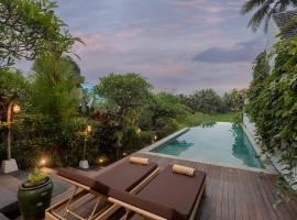 รูปภาพของโรงแรม: Ubud Padi Villas