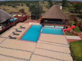 होटल की एक तस्वीर: Falcon Lodge Bela Bela