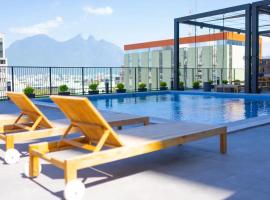 Fotos de Hotel: Lux 2 bedroom apartment, swimming pool, gym and free parking spot in Macro Plaza area