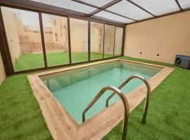 Casa Rural Nueve Villas, hotel in Amusco