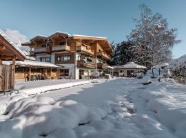 Flora - Das kleine Gartenhotel, hotel v destinaci Ellmau