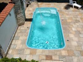 מלון צילום: Casa confortável com piscina