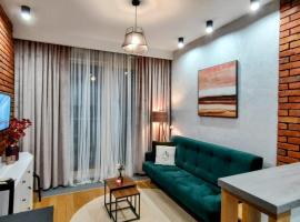 รูปภาพของโรงแรม: ApartamentySnu, Wola Premium IV z parkingiem