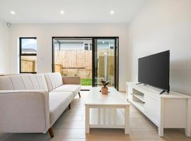 Фотография гостиницы: Te Atatu Cozy Brand New House 4