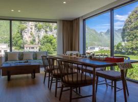 Fanzhu Hotel, hôtel à Xingyi