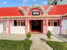 รูปภาพของโรงแรม: OYO Flagship Ring & Roses Wedding Paradise