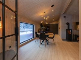 A picture of the hotel: High standard cabin in a quiet area in the bossom of nature near Flå