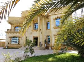 Hotel fotografie: Villa Room #6 in Umm Al Sheif