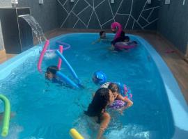 Hotel Foto: Casa com piscina