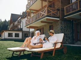 Foto di Hotel: Pohorje Village Wellbeing Resort - Family Apartments Bolfenk