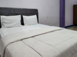 Foto di Hotel: Puspita Homestay Mitra RedDoorz