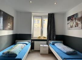 Фотография гостиницы: Modernes Apartment 4 mit 6 einzelnen Betten
