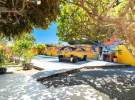 Hotel fotografie: Maison d'invités dans jardin tropical avec piscine à Tahiti
