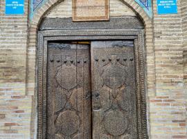 Hotel fotoğraf: Orient Star Khiva Hotel- Madrasah Muhammad Aminkhan 1855