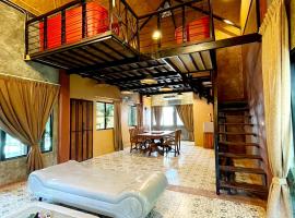 รูปภาพของโรงแรม: Baibon Boutique House Thalang Phuket