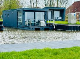 ホテル写真: Uniek overnachten in een Tiny House op de Appelhof