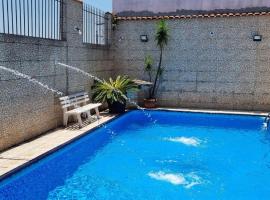 Foto di Hotel: Casa com piscina e lazer