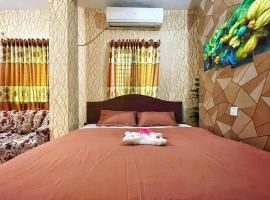 รูปภาพของโรงแรม: Hotel Shogondha Residential,