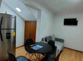 Фотография гостиницы: Ecualodge 22 Elegante suite en el centro de Cuenca