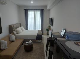 Foto di Hotel: Comfy Studio with City View @BorneoBay Residence