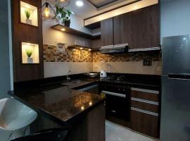 Apartamento en condominio con piscina, hôtel à Villavicencio