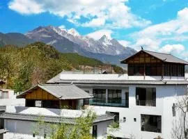 Lijiang Hengchang Baoyin Mohuakai Inn, hotel in Lijiang