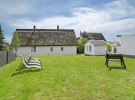 Хотел снимка: Reetferienhaus Lütt