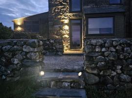 होटल की एक तस्वीर: cosy cottage in snowdonia