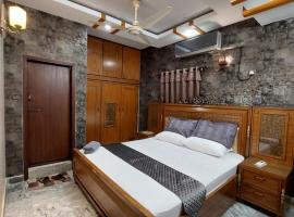 Travellers Home 2BR PORTION Gulshan Iqbal blk#7, hotel i Karachi