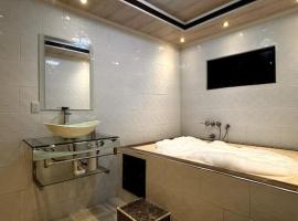 Hotel foto: Jacuzzi privado y cama king parqueo exclusivo