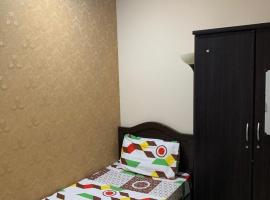 Foto di Hotel: Big single partition with shared bathroom 302 Room 1