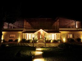 The Windchimes Retreat Coorg, hotel en Virajpet