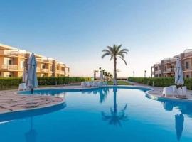 شاليه مميز بقريه مارينا دلتا السياحيه olooool8369, ξενοδοχείο σε Al Ḩammād