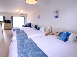 オーシャンビューハウス美ら海, hôtel à Kitazato