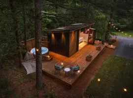 Glamping cottage with glass front and hot tub!