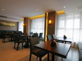 Хотел снимка: Home Inn Plus Yantai City Hall Harbour City East Avenue