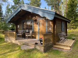 Timrad stuga i kanten av skogen med SPA möjlighet, hotel en Mullsjö